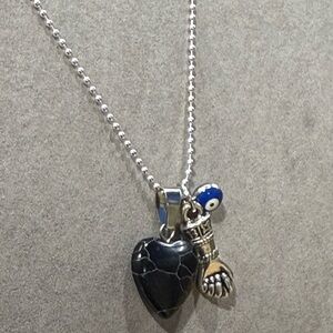 Silver Lucky Necklace with black Heart, evil eye bead and Hand Charms